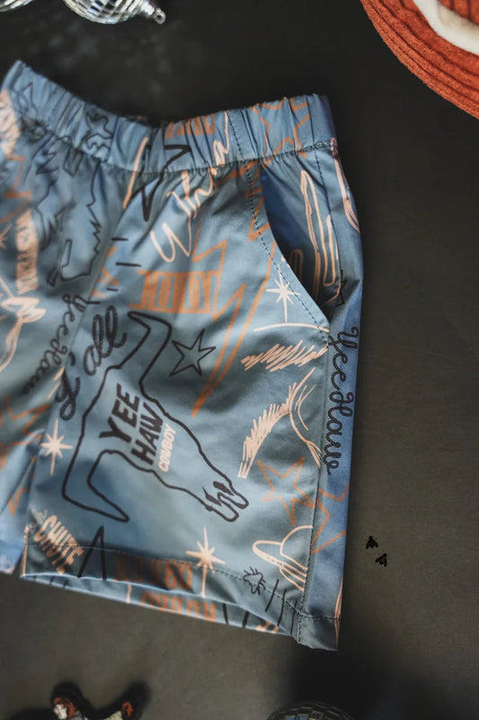 Knarly cowboy swim trunks